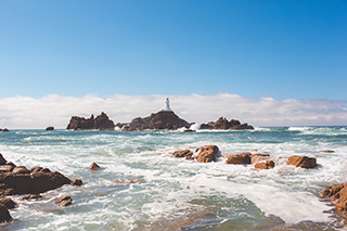 La Corbiere on a sunny day with a choppy high tide