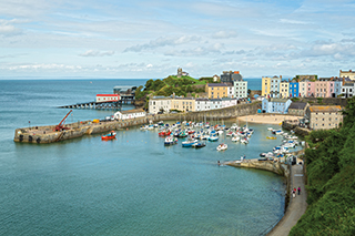 Tenby Harbour with boats and jetty